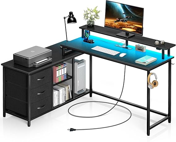 Seventable L Shaped Computer Desk with Drawers, Reversible Gaming Desk with LED Lights &amp; Charging Port, Corner Desk with Storage Shelves &amp; Monitor Stand for Home Office Black